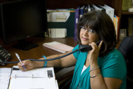 woman on phone in office